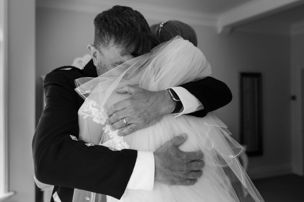 Bride first look with dad for a personalised fun wedding