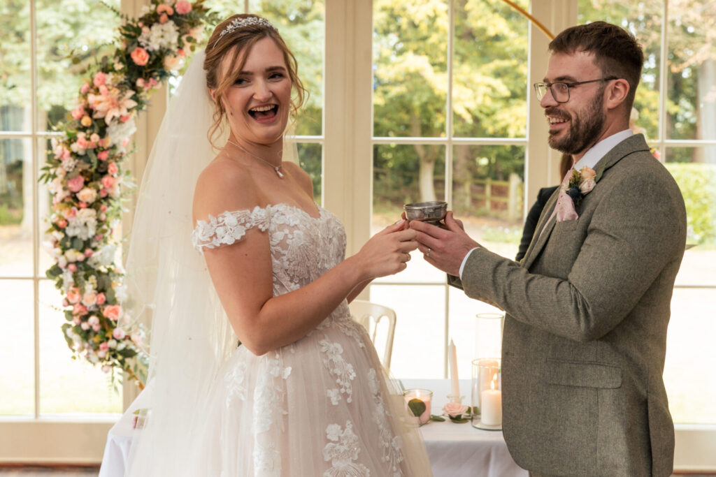 Bride and groom in the ceremony for a personalised fun wedding