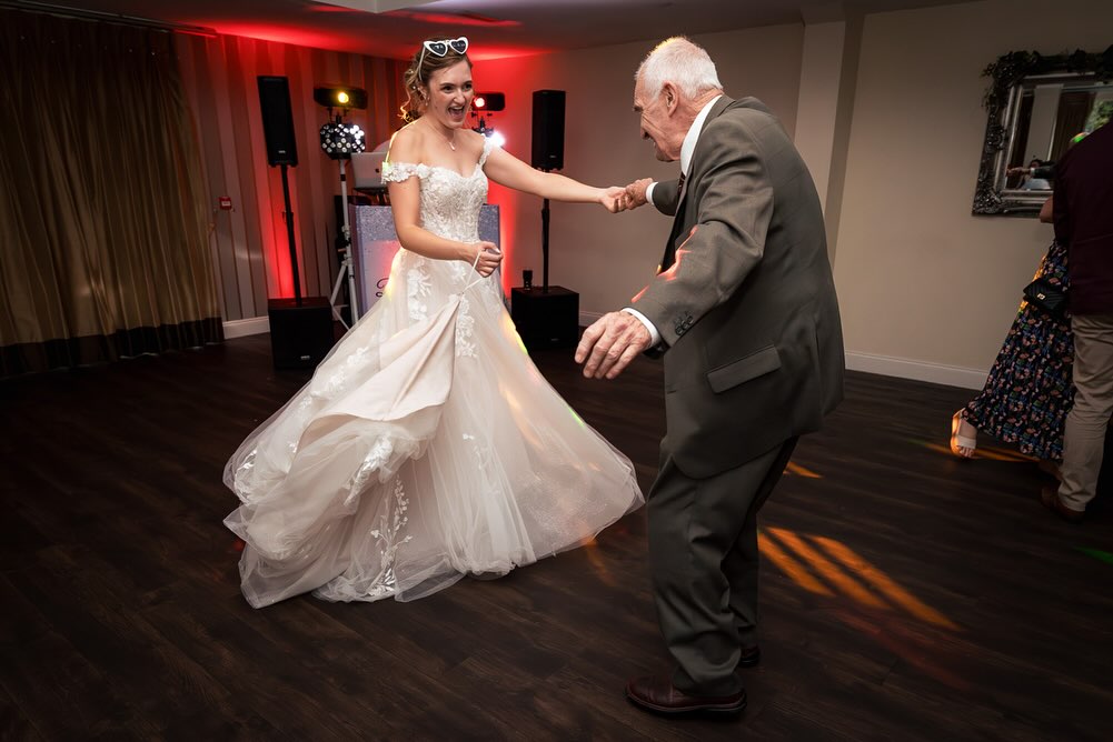 Bride dancing with grandad for a personalised fun wedding